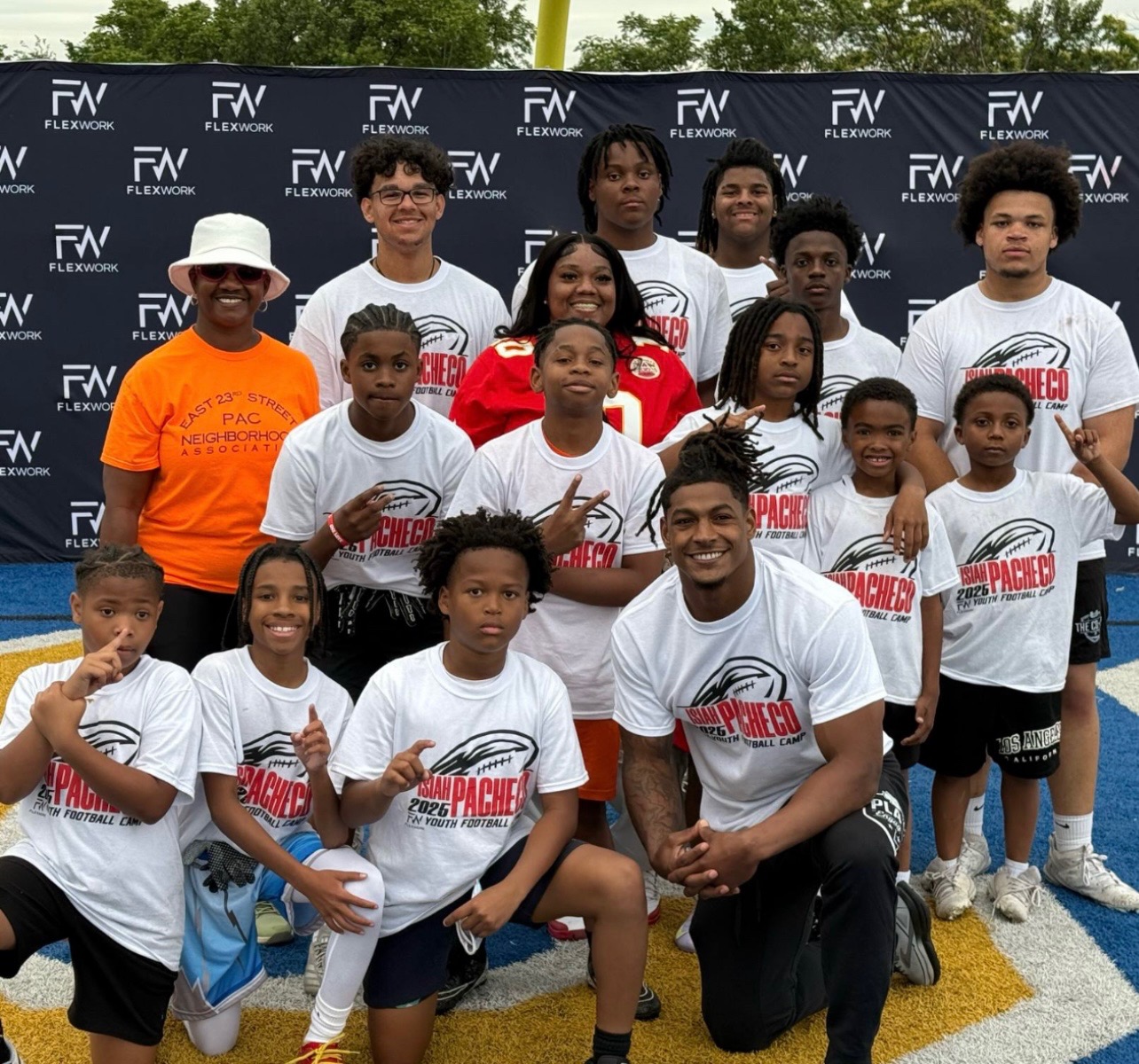 Young people from the neighborhood at a youth football camp.